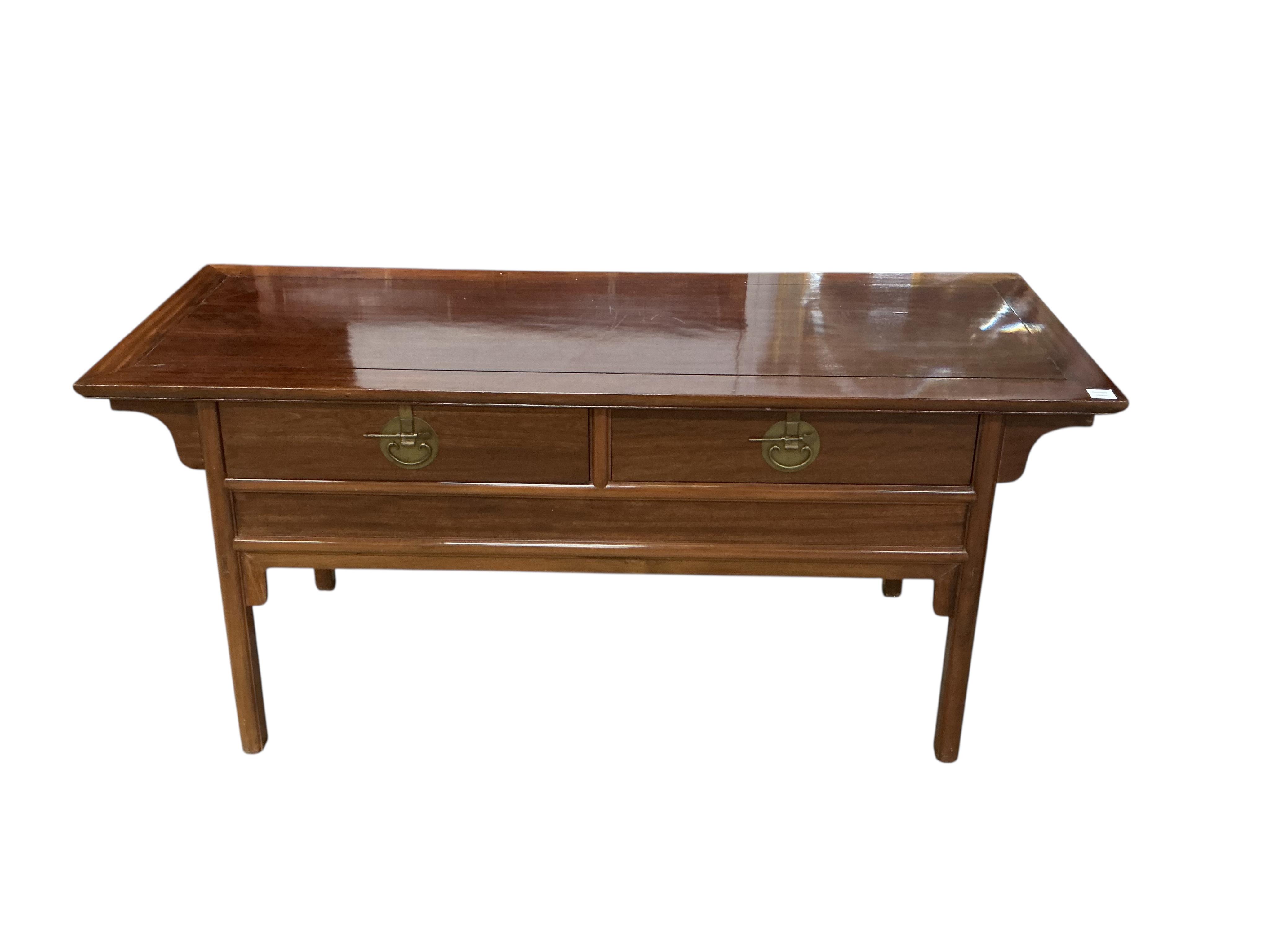 A Chinese hardwood two drawer serving table, width 172cm, depth 61cm, height 82cm